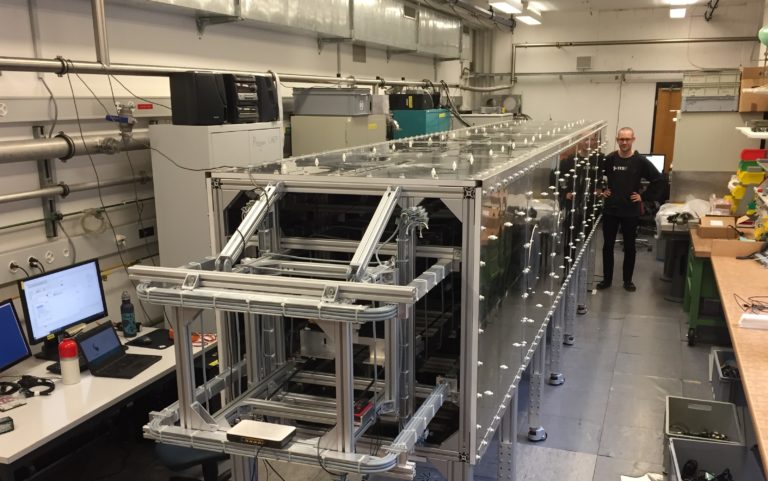 Part of the experimental apparatus in the laboratory in Bern with doctoral student Ivo Schulthess.